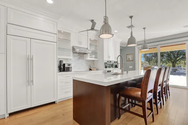 a view of dining table and chairs