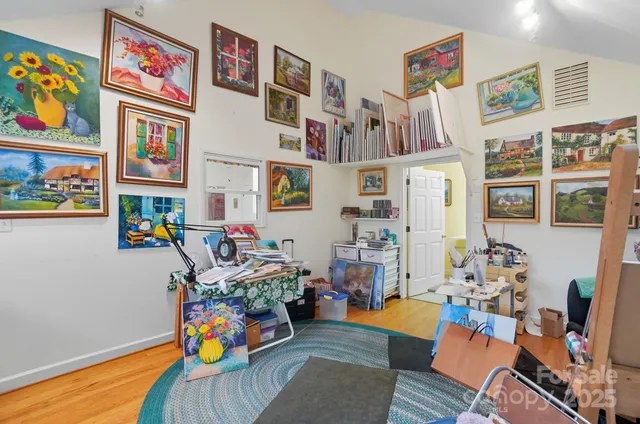 a children room with furniture and toys