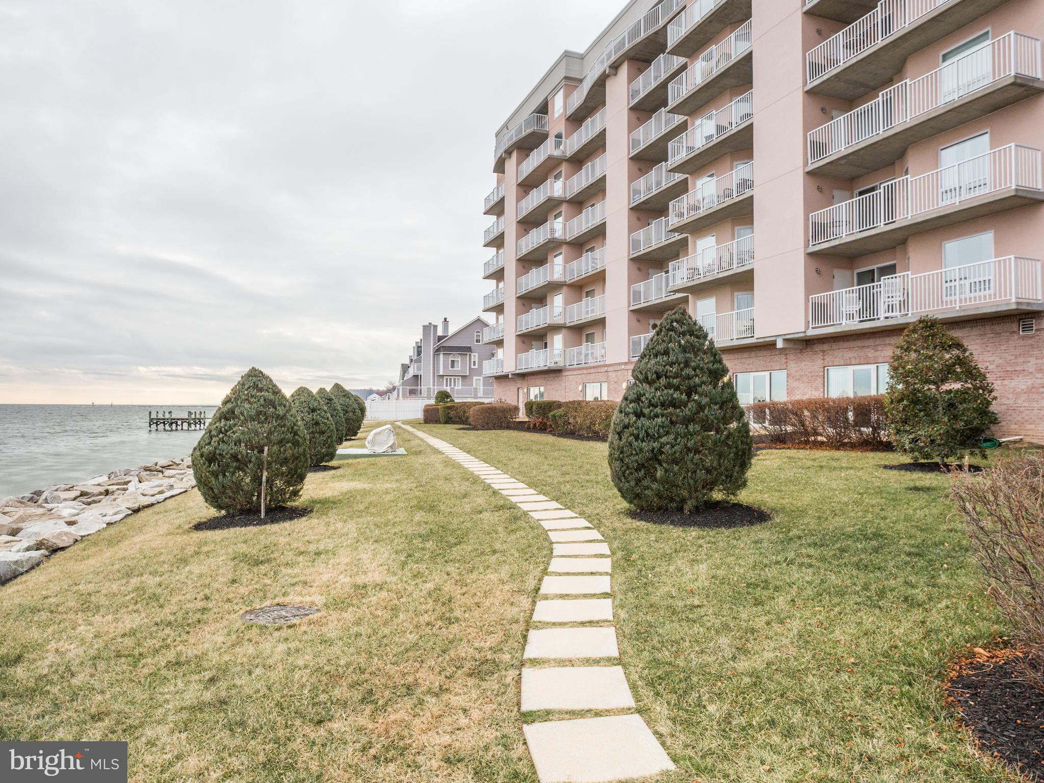 8501 Bayside Road, Unit 500 Chesapeake Beach, MD 20732 - Photo 20 of 30 Manicured grounds perfect for a morning stroll.