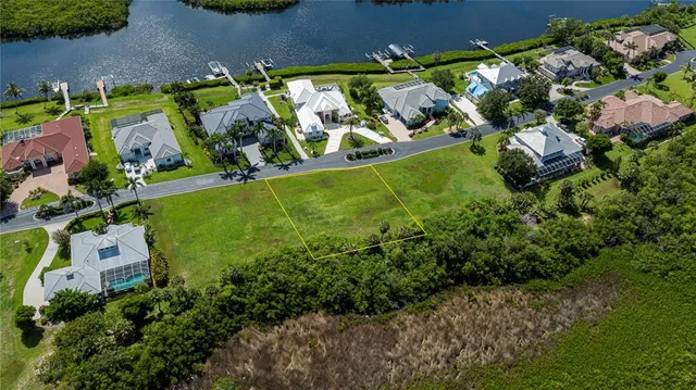 a view of a golf course with a lake