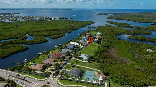 a view of a golf course with a lake