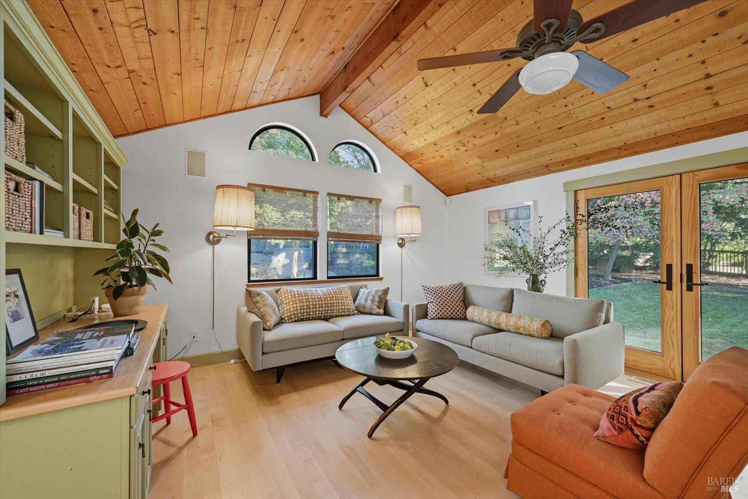 246 Zinfandel Road Healdsburg, CA 95448 - Photo 12 of 50 a living room with furniture a fireplace and a chandelier