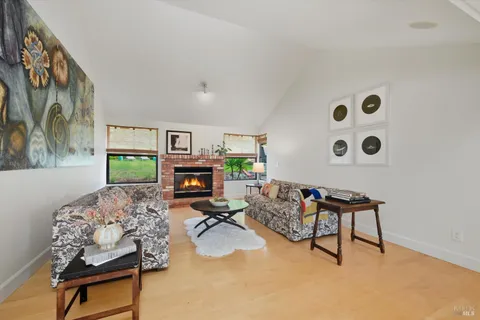 a view of a two chairs in the patio