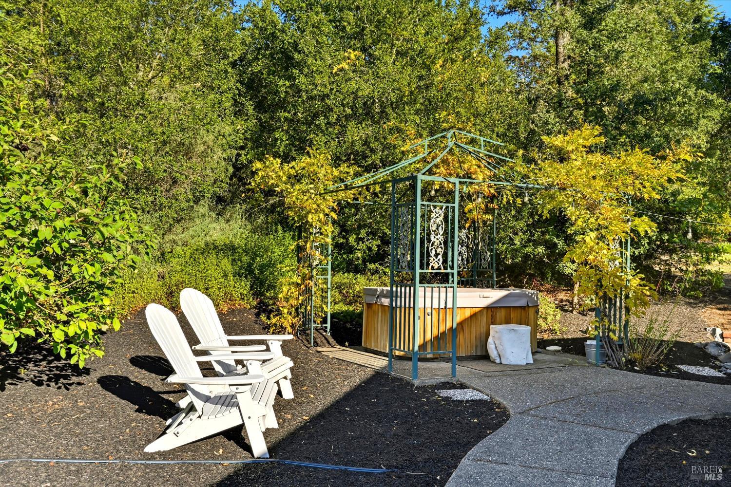 246 Zinfandel Road Healdsburg, CA 95448 - Photo 19 of 50 a view of a two chairs in the patio