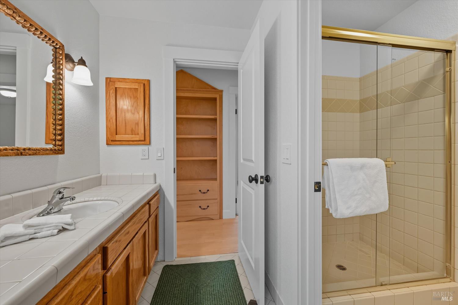 246 Zinfandel Road Healdsburg, CA 95448 - Photo 26 of 50 a bathroom with a sink and a mirror