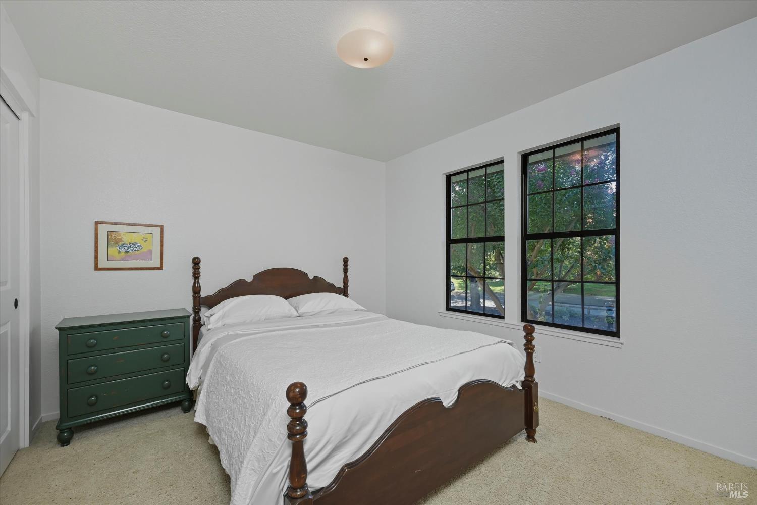 246 Zinfandel Road Healdsburg, CA 95448 - Photo 28 of 50 a bedroom with a bed and a window