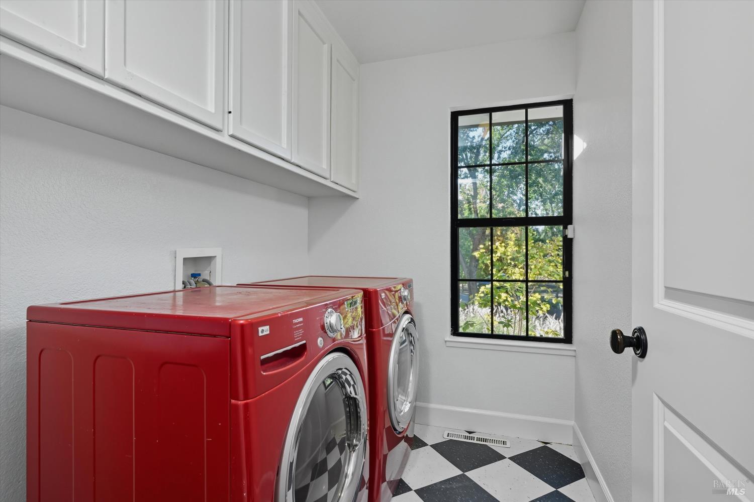 246 Zinfandel Road Healdsburg, CA 95448 - Photo 30 of 50 a utility room with dryer and washer