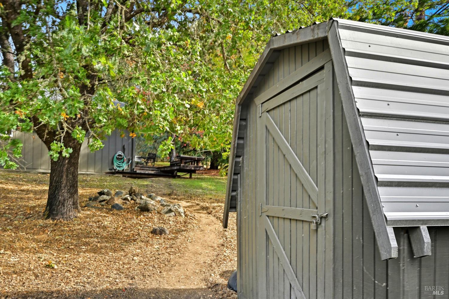 246 Zinfandel Road Healdsburg, CA 95448 - Photo 39 of 50 a view of a backyard with cabin