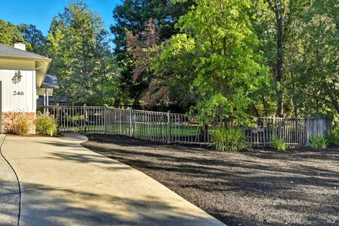 a view of a house with a garden
