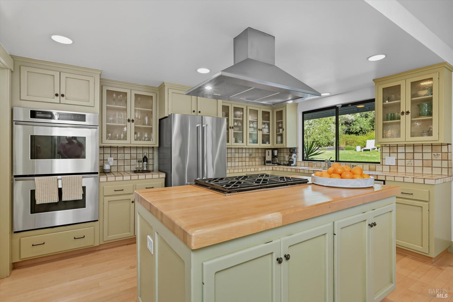 246 Zinfandel Road Healdsburg, CA 95448 - Photo 6 of 50 a kitchen with stainless steel appliances a sink and a refrigerator