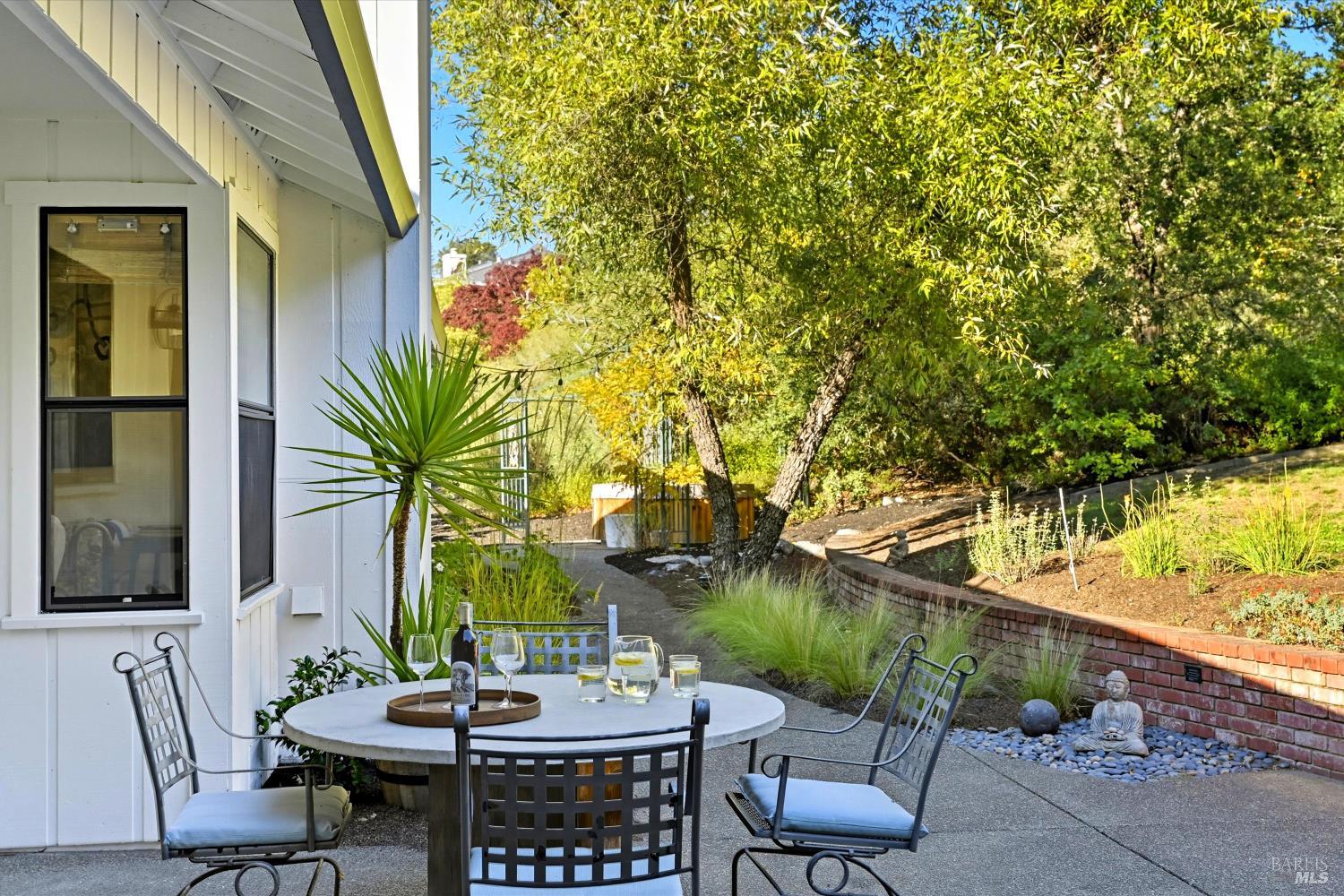 246 Zinfandel Road Healdsburg, CA 95448 - Photo 10 of 50 a view of a patio with garden area