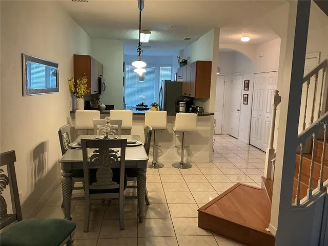 a view of a dining room with furniture