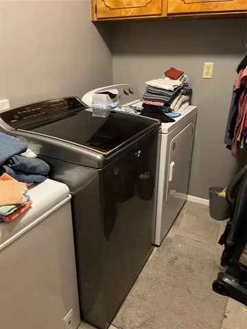 a stove top oven sitting inside of a kitchen