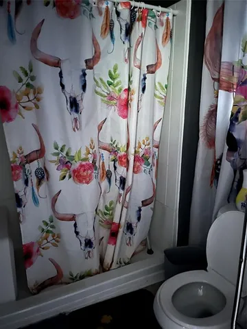 a room with lots of different furniture and flowers