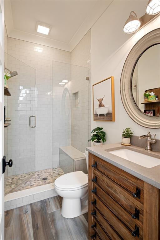 13235 Arnold Mill Road Roswell, GA 30075 - Photo 19 of 72 a bathroom with a sink a toilet and shower