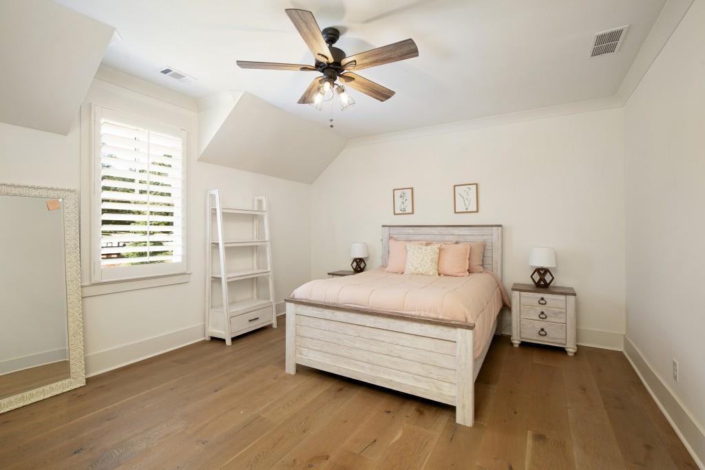 13235 Arnold Mill Road Roswell, GA 30075 - Photo 32 of 72 a bedroom with a bed and a window
