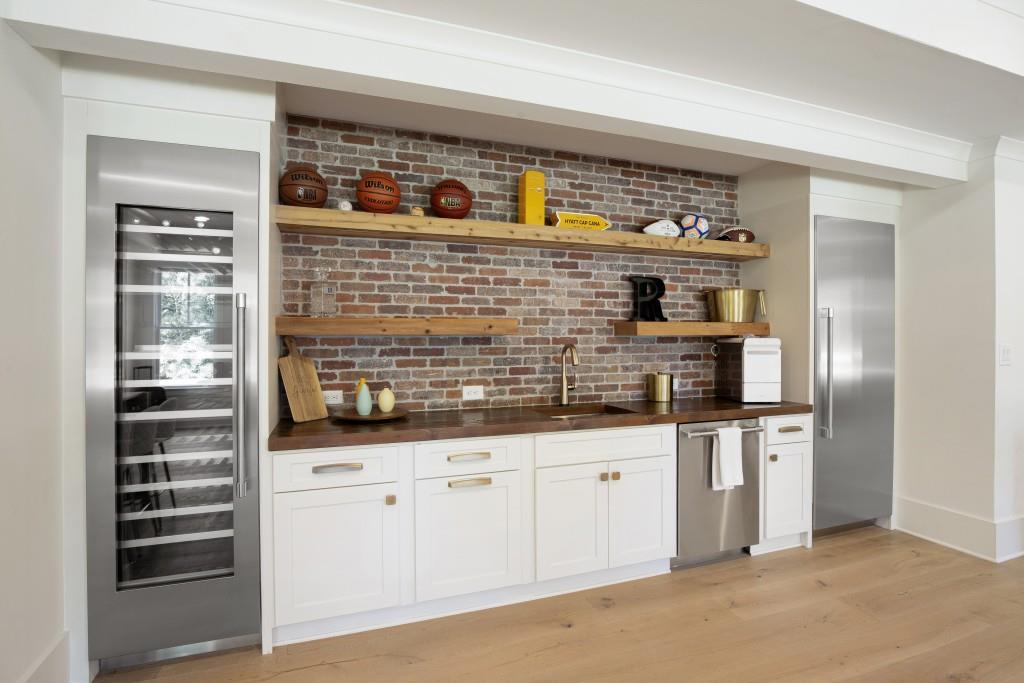 13235 Arnold Mill Road Roswell, GA 30075 - Photo 40 of 72 a kitchen with granite countertop a refrigerator and a sink