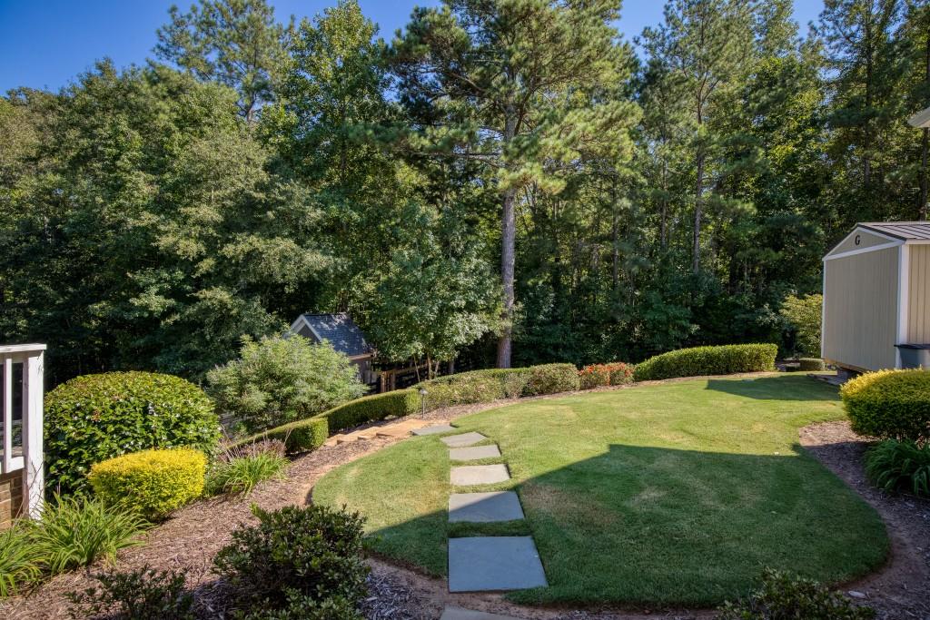 13235 Arnold Mill Road Roswell, GA 30075 - Photo 59 of 72 a view of a backyard with large trees