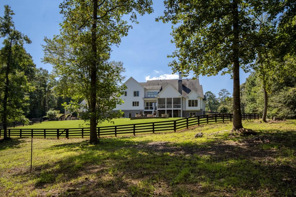 13235 Arnold Mill Road Roswell, GA 30075 - Photo 67 of 72 a view of a house with a yard