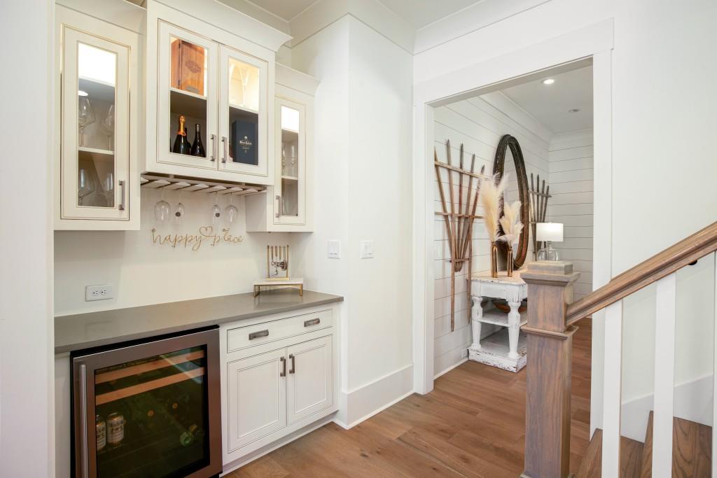 13235 Arnold Mill Road Roswell, GA 30075 - Photo 10 of 72 a kitchen with cabinets and wooden floor
