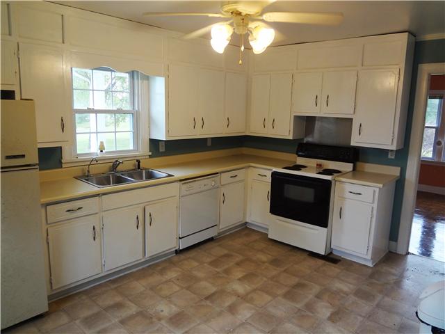 202 Johnson Branch Road Pulaski, TN 38478 - Photo 8 of 16 This kitchen offers plenty of cabinet and counter spaces, as well as, a nice sized pantry.