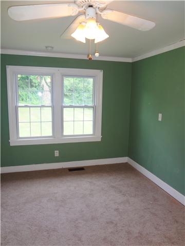 202 Johnson Branch Road Pulaski, TN 38478 - Photo 9 of 16 This first bedroom offers plenty of room for your furniture and has a nice view of the backyard out of the Newly replaced window.