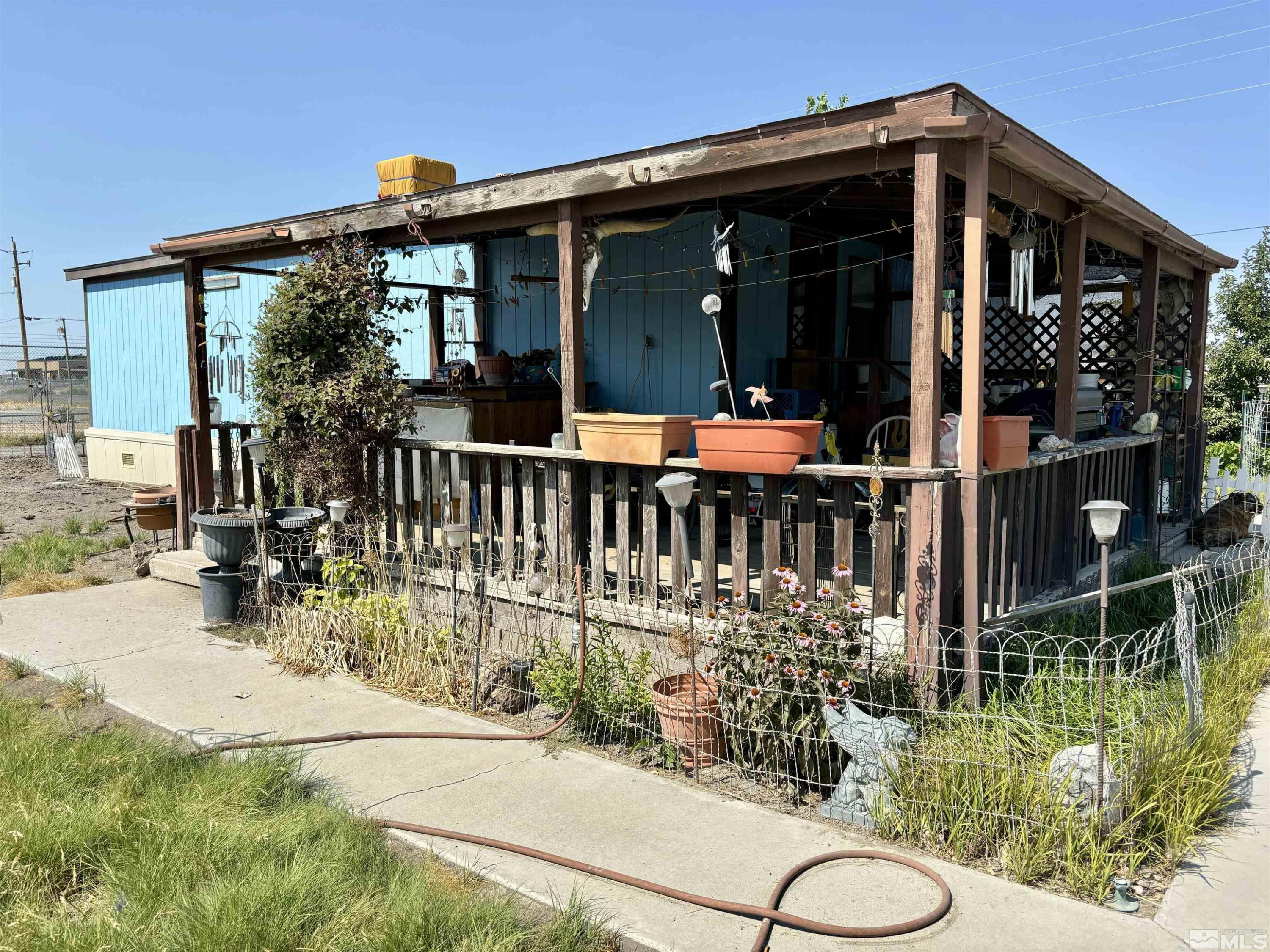 660 South Meridian Road Lovelock, NV 89419 - Photo 13 of 20 front view of a house with a yard