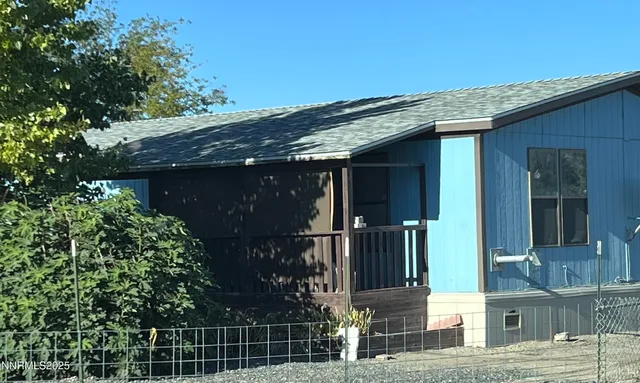 a front view of a building with street view