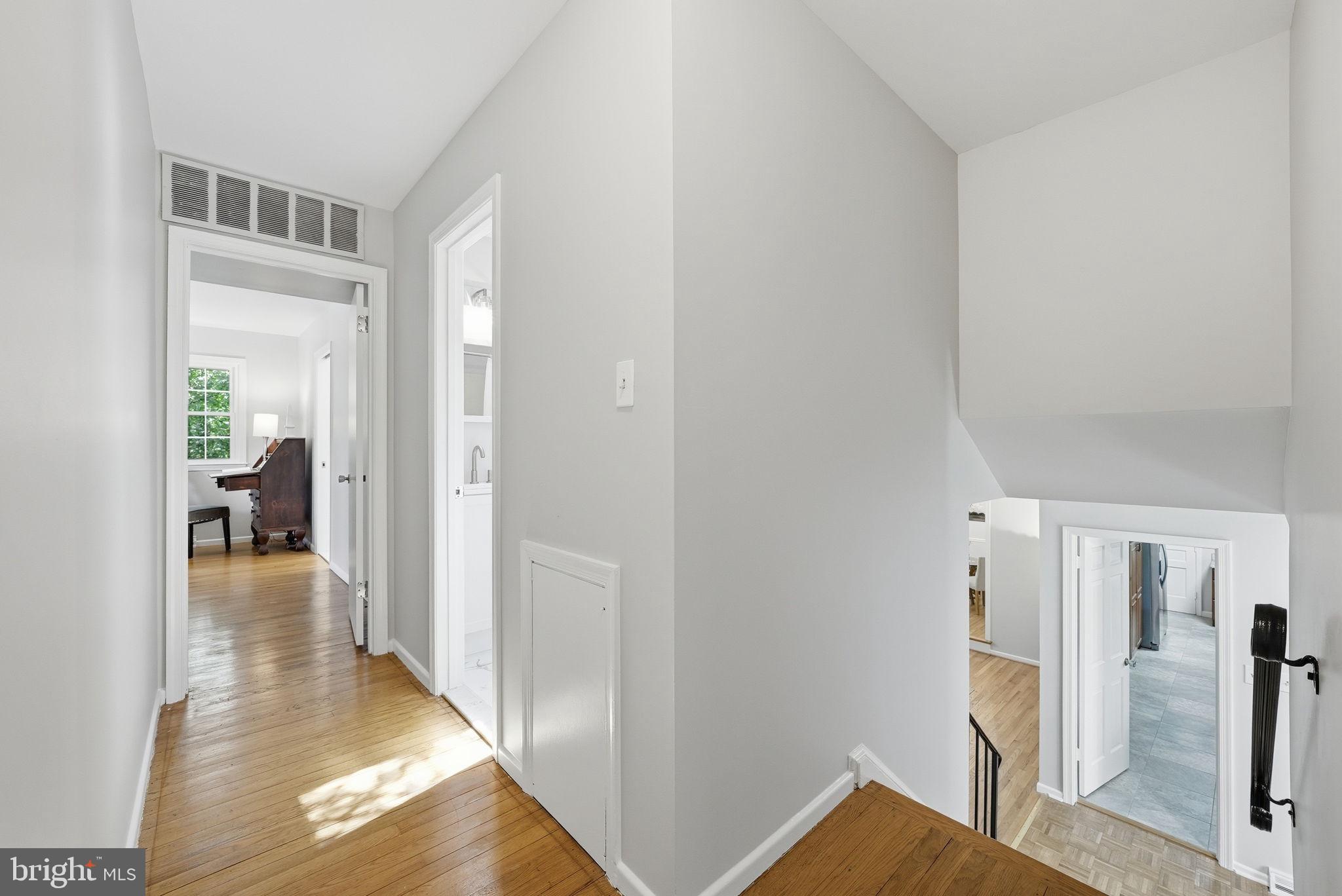 2327 Riviera Drive Vienna, VA 22181 - Photo 20 of 42 Upper hallway with recently revealed hardwoods