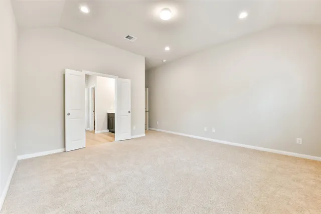 a bathroom with a double vanity sink a mirror and a shower