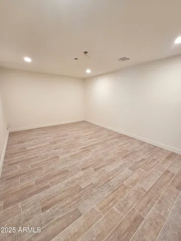 a bathroom with a toilet and shower