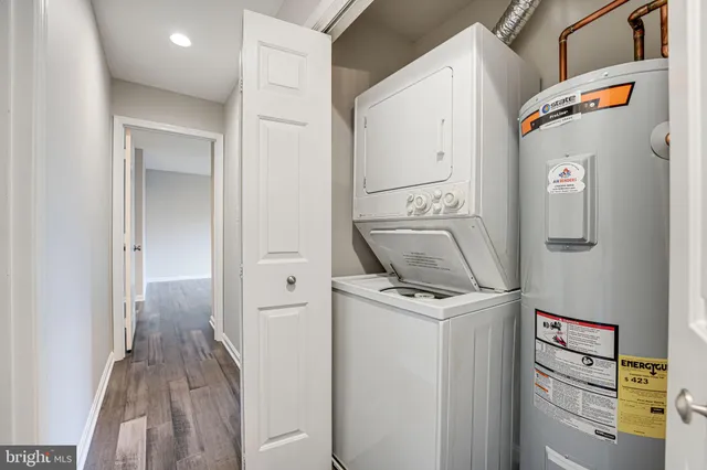 a view of storage and utility room with a washer dryer