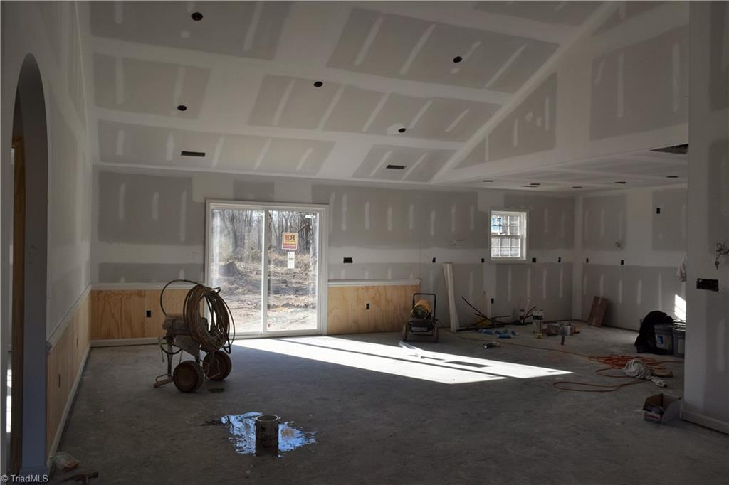 7909 Lester Road Stokesdale, NC 27357 - Photo 10 of 30 Open dining area and kitchen 1-6-21