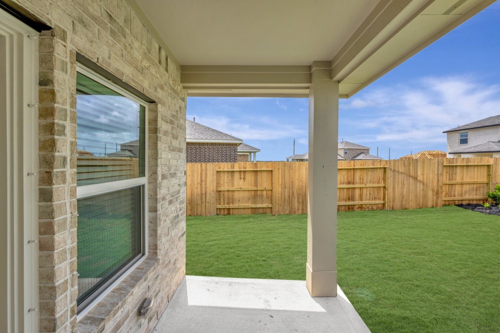 7914 Jasper Mdws Way Angleton, TX 77515 - Photo 31 of 33 Back patio and large yard.