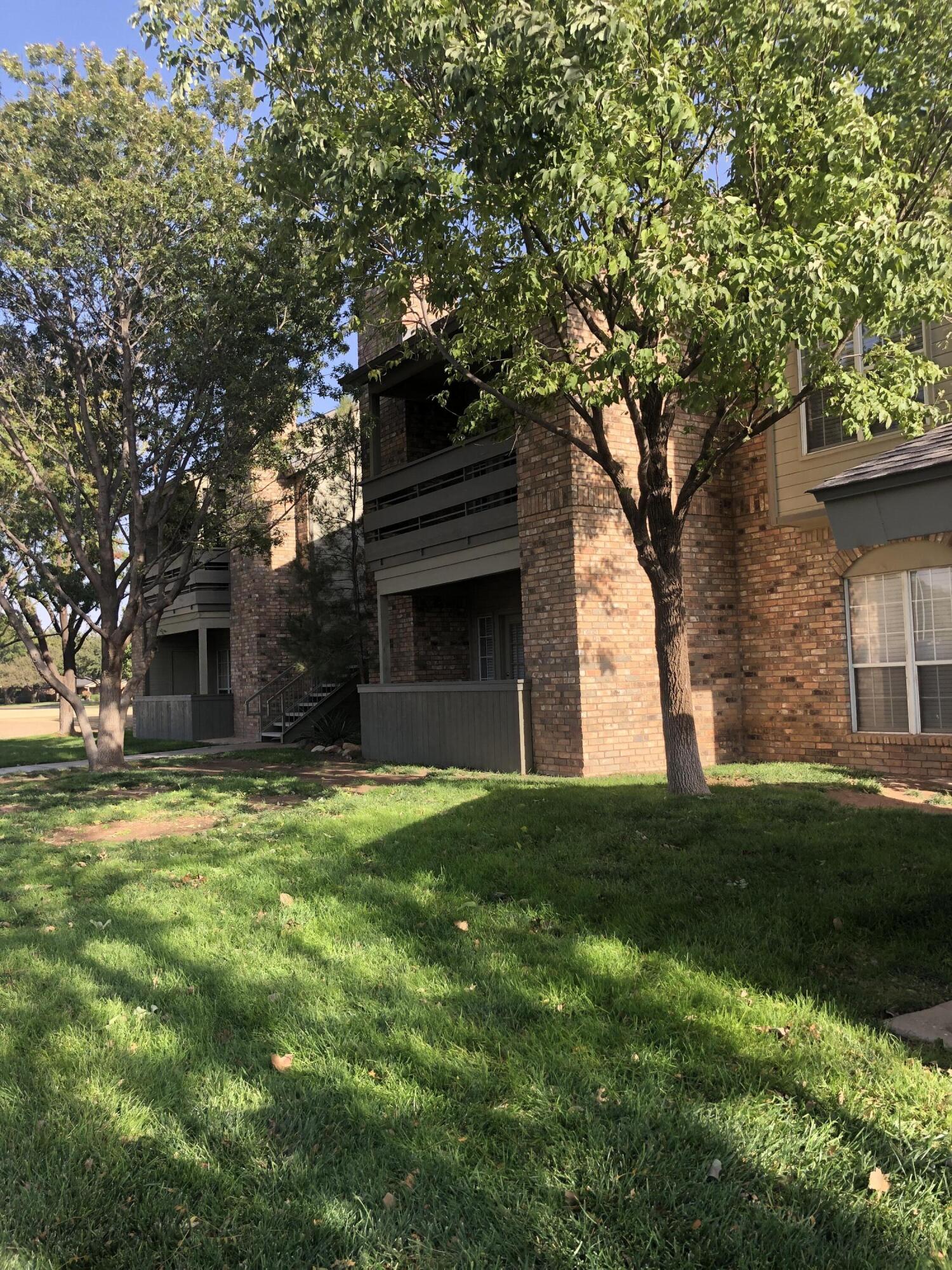 5102 80th Street Lubbock, TX 79424 - Photo 2 of 20 a view of a house with a yard