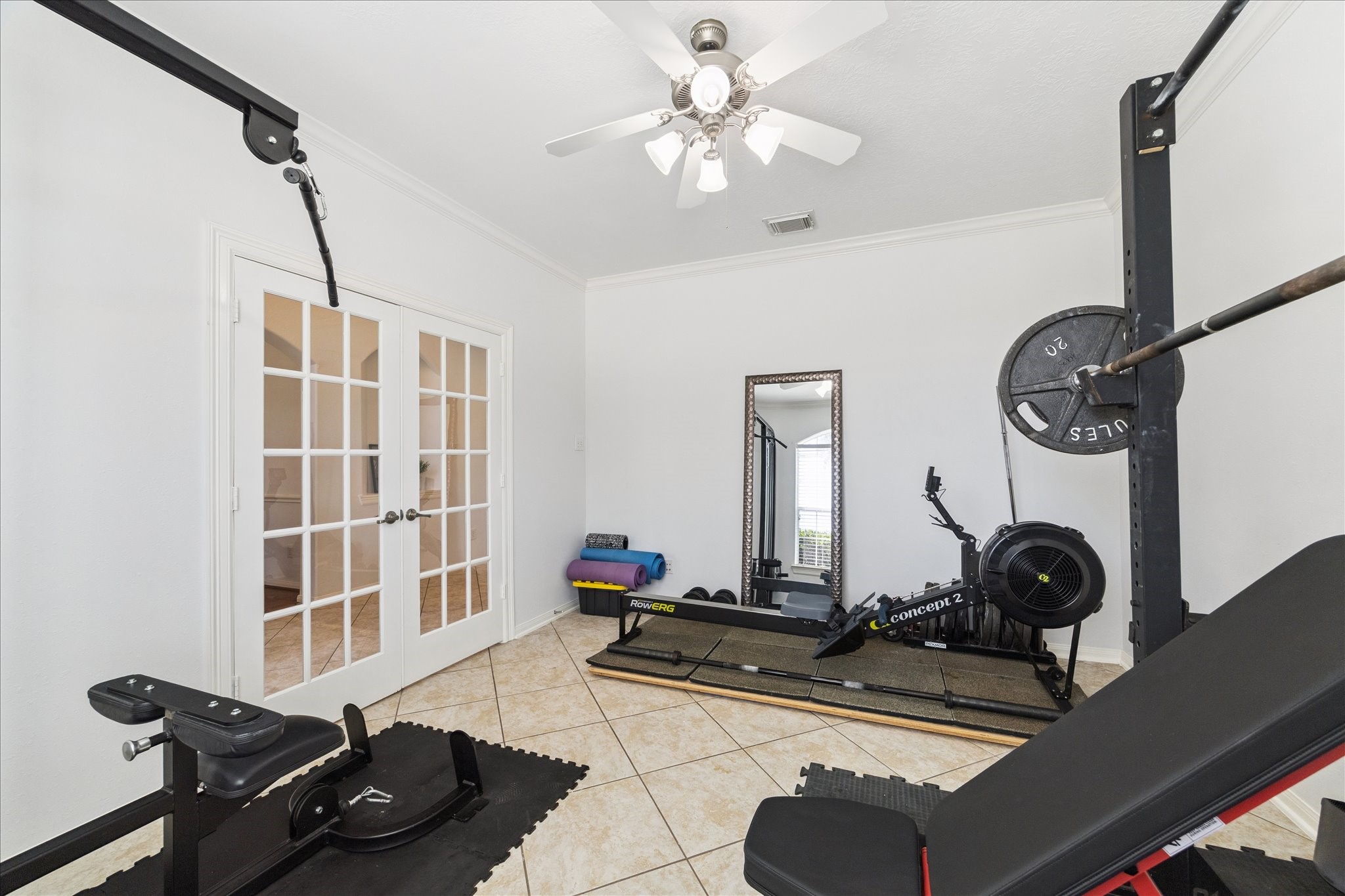 5315 Maverick Point Lane Katy, TX 77494 - Photo 11 of 29 a room with gym equipment and view of living room