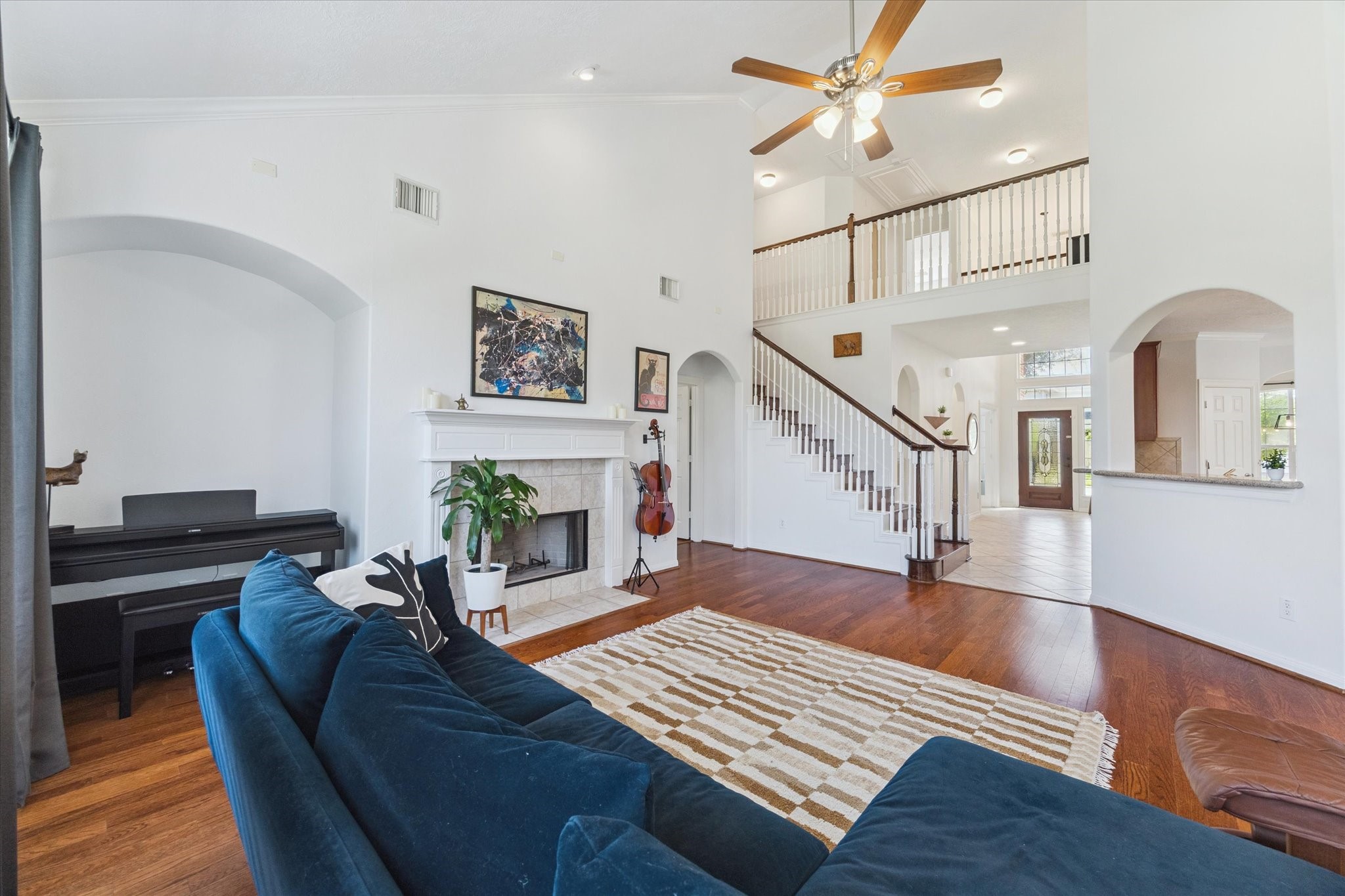 5315 Maverick Point Lane Katy, TX 77494 - Photo 13 of 29 a living room with furniture and a wooden floor