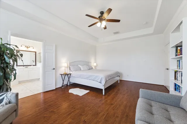 a bedroom with a bed furniture and a window