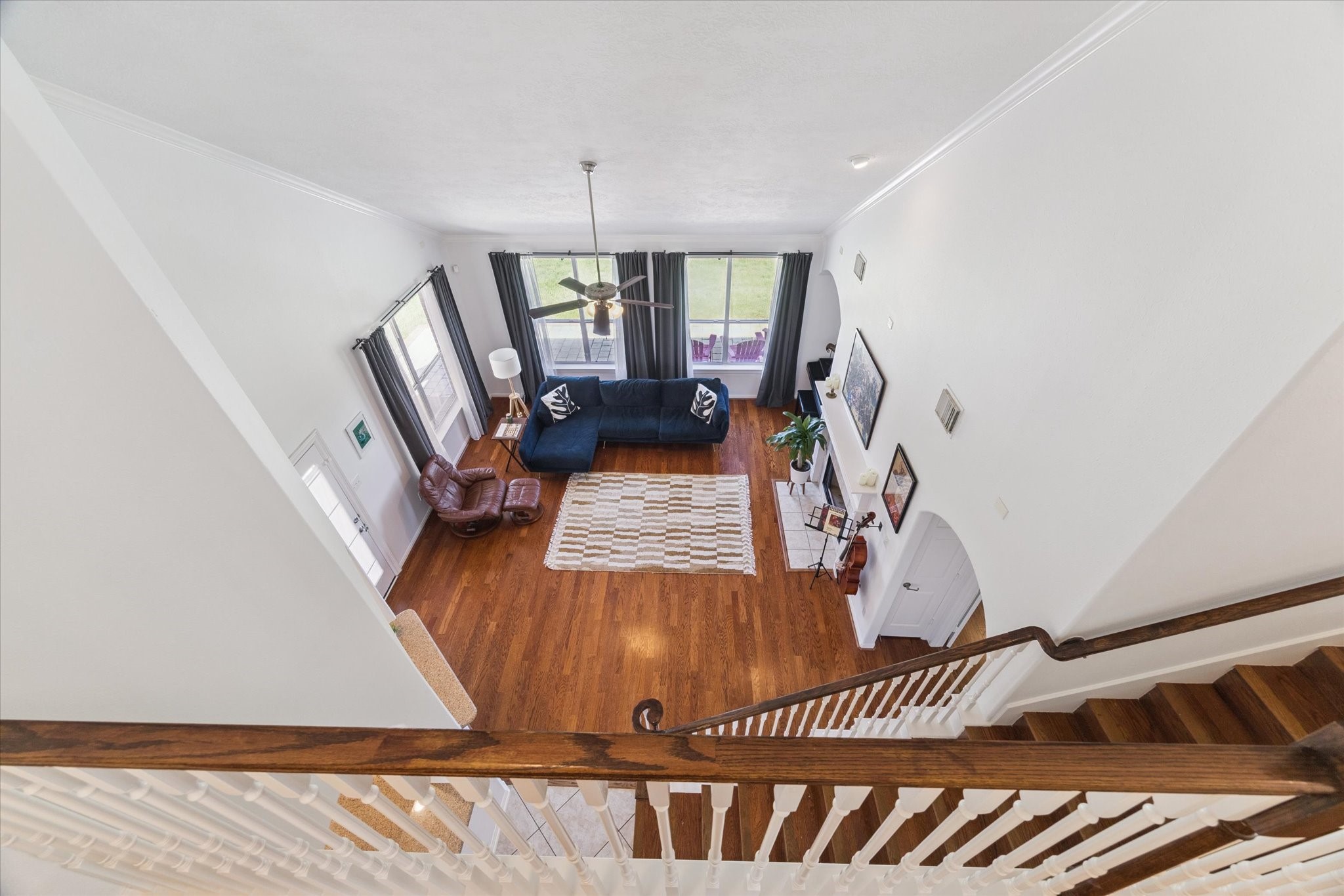 5315 Maverick Point Lane Katy, TX 77494 - Photo 18 of 29 a view of a livingroom with wooden floor and staircase