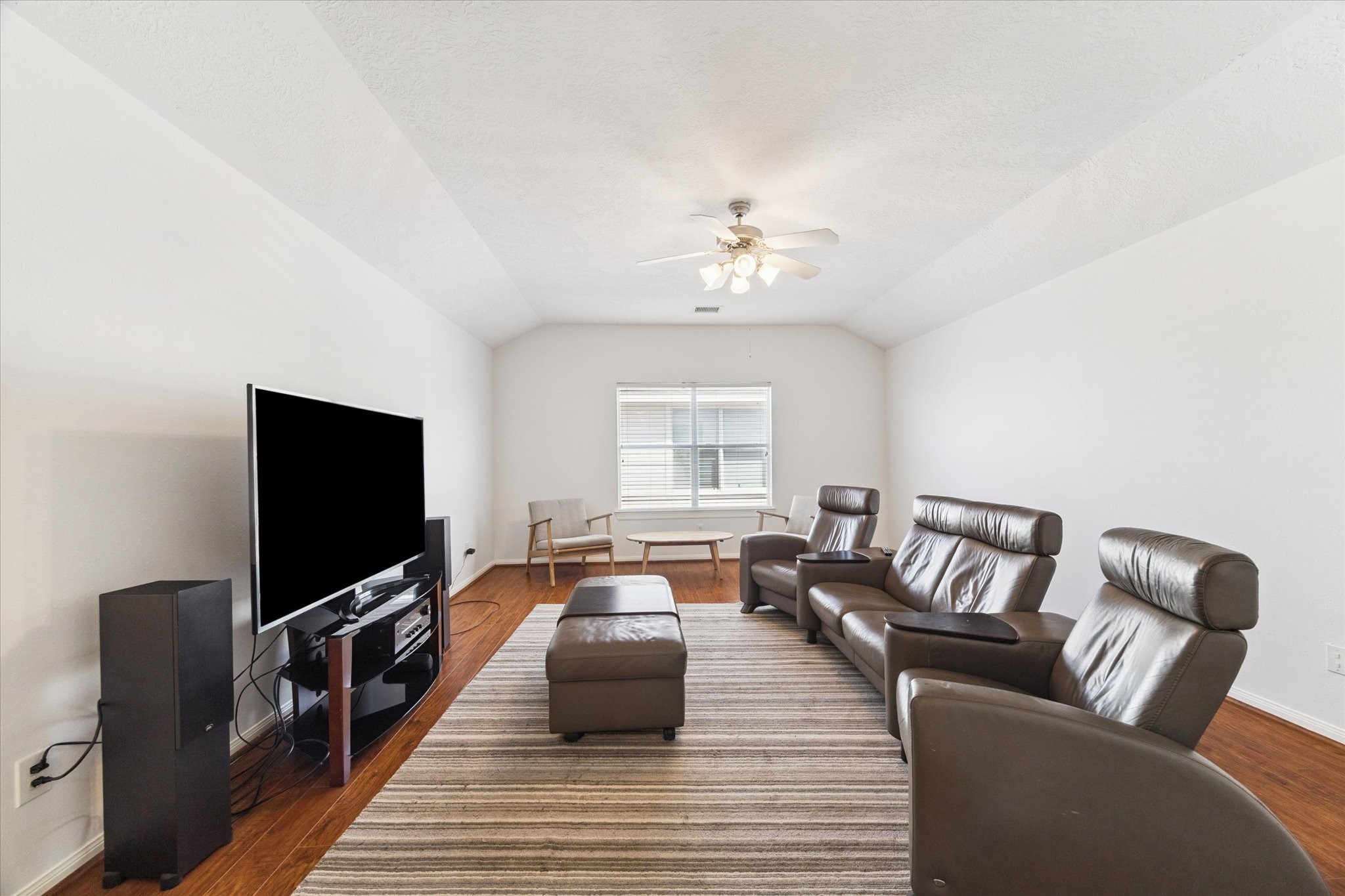 5315 Maverick Point Lane Katy, TX 77494 - Photo 20 of 29 a living room with furniture and a flat screen tv