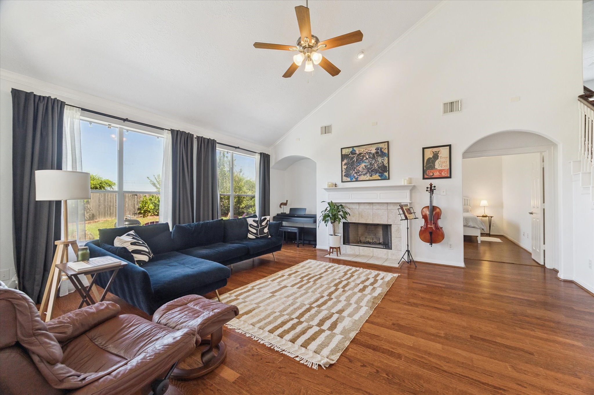 5315 Maverick Point Lane Katy, TX 77494 - Photo 2 of 29 a living room with furniture and a fireplace