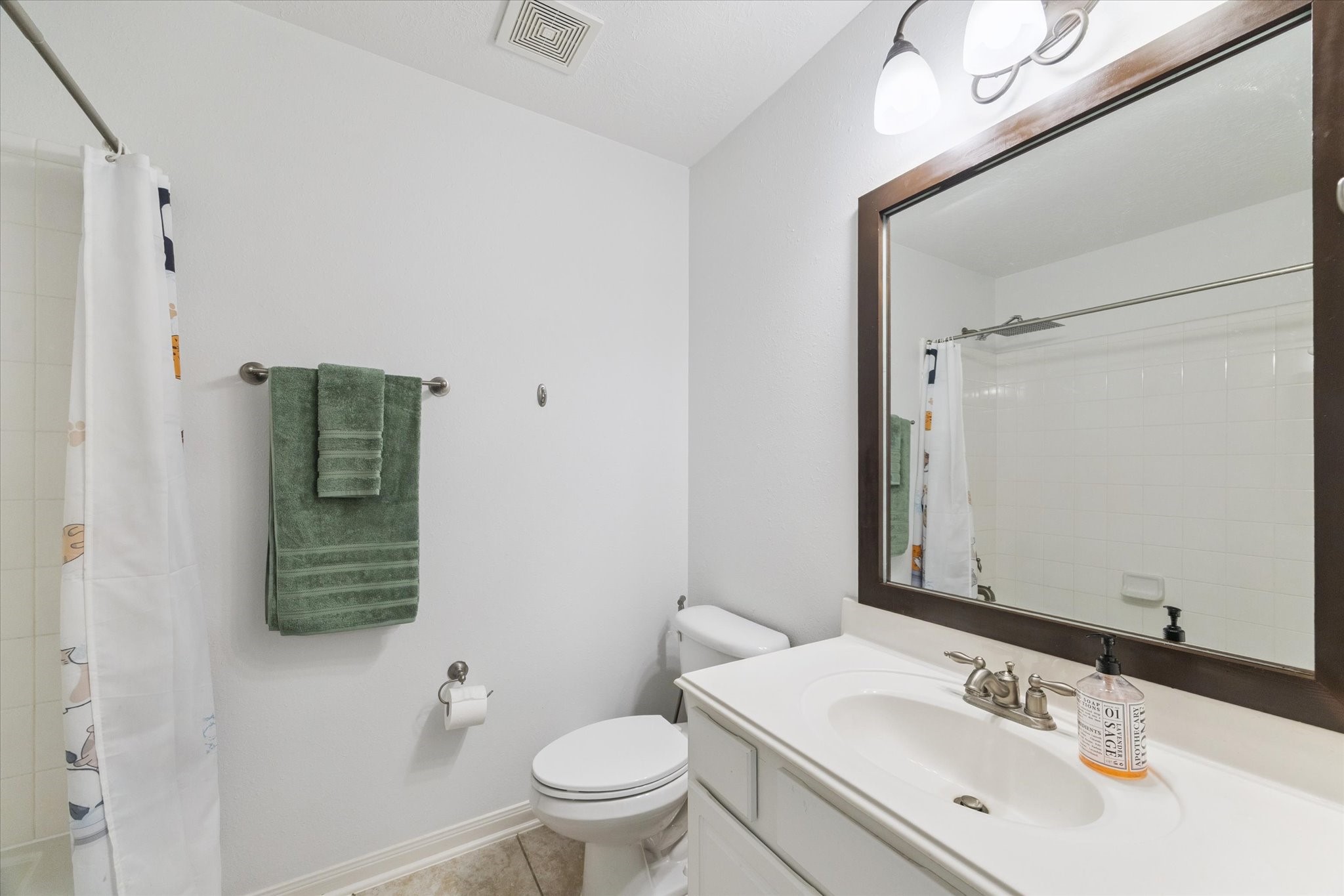 5315 Maverick Point Lane Katy, TX 77494 - Photo 23 of 29 a bathroom with a sink a toilet and shower