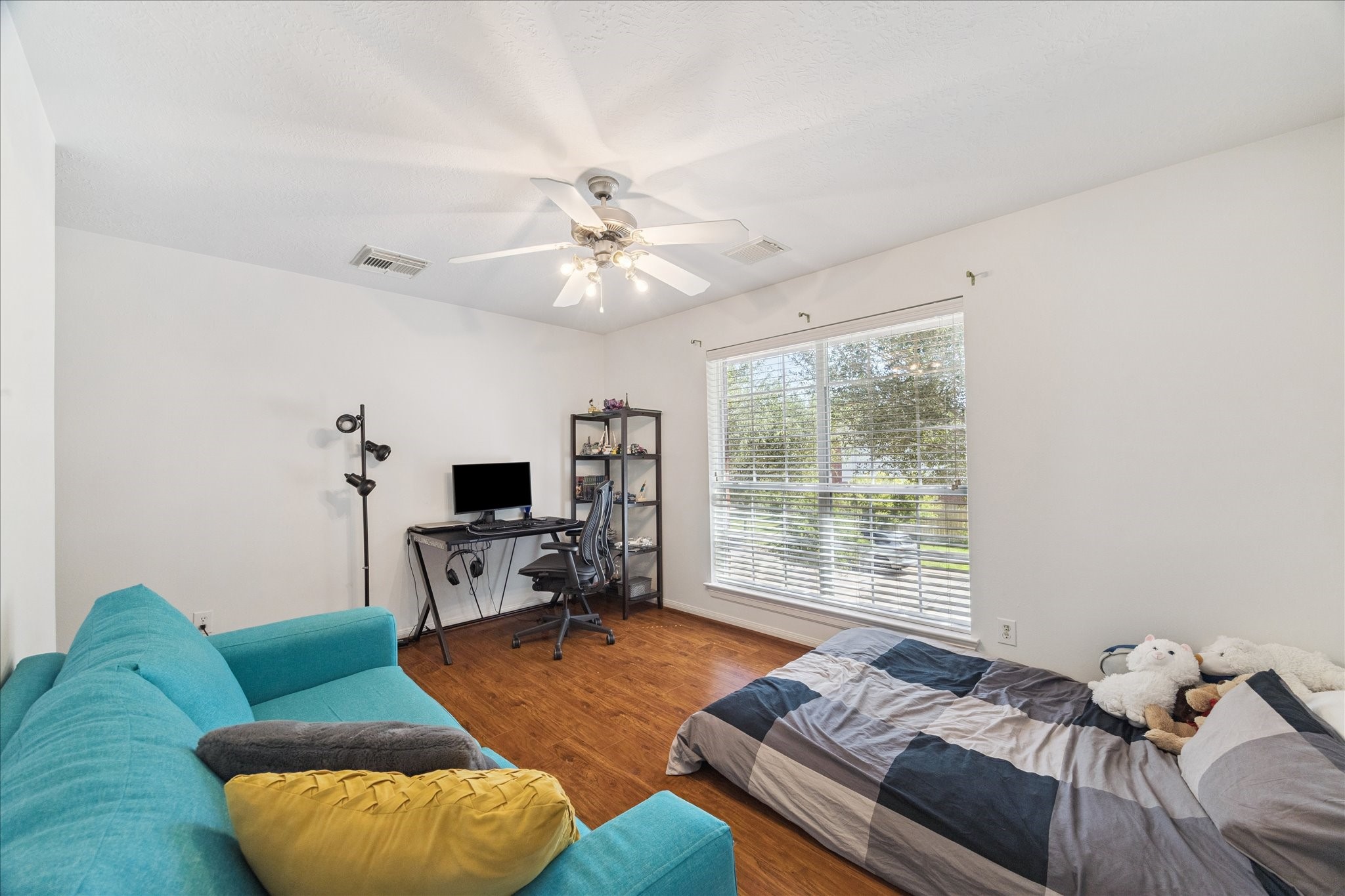 5315 Maverick Point Lane Katy, TX 77494 - Photo 24 of 29 a living room with furniture and a flat screen tv
