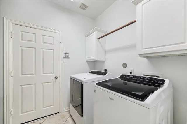 a kitchen with a stove and a sink