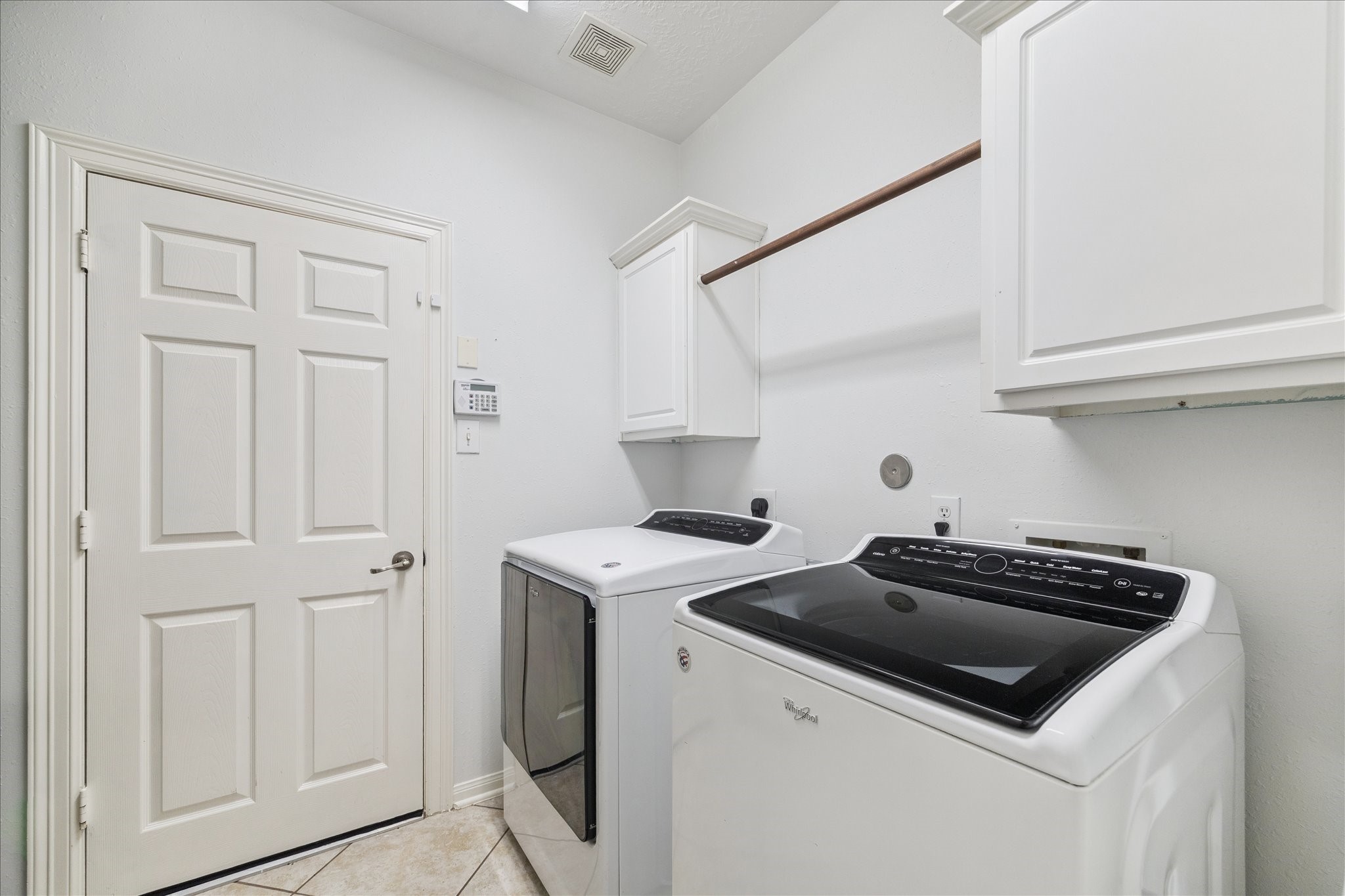 5315 Maverick Point Lane Katy, TX 77494 - Photo 27 of 29 a kitchen with a stove and a sink