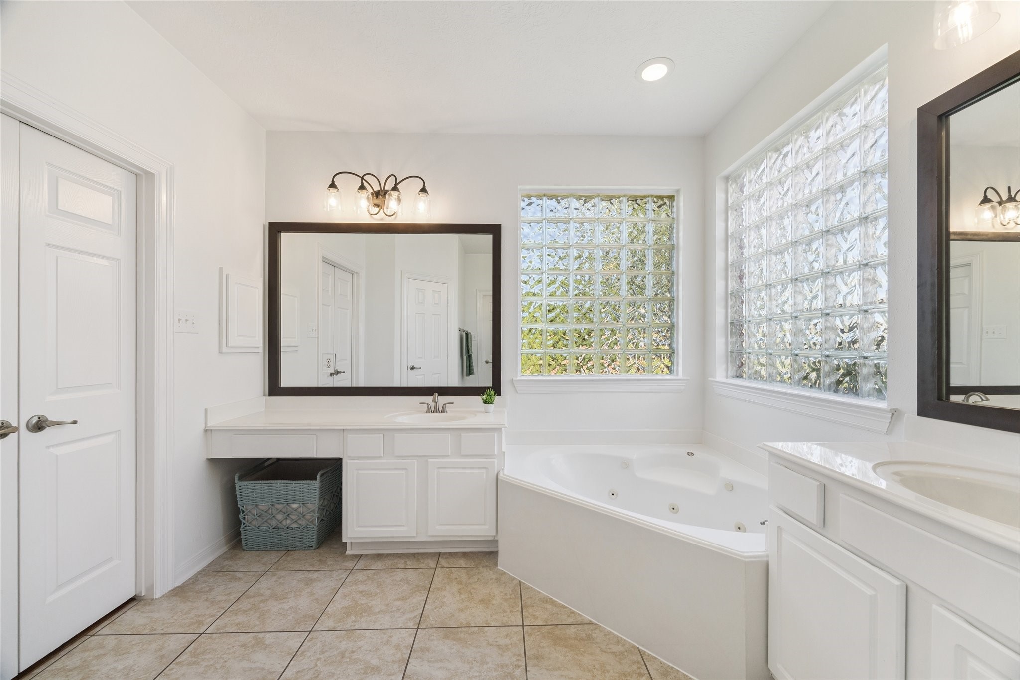5315 Maverick Point Lane Katy, TX 77494 - Photo 6 of 29 a spacious bathroom with a tub a sink and a window