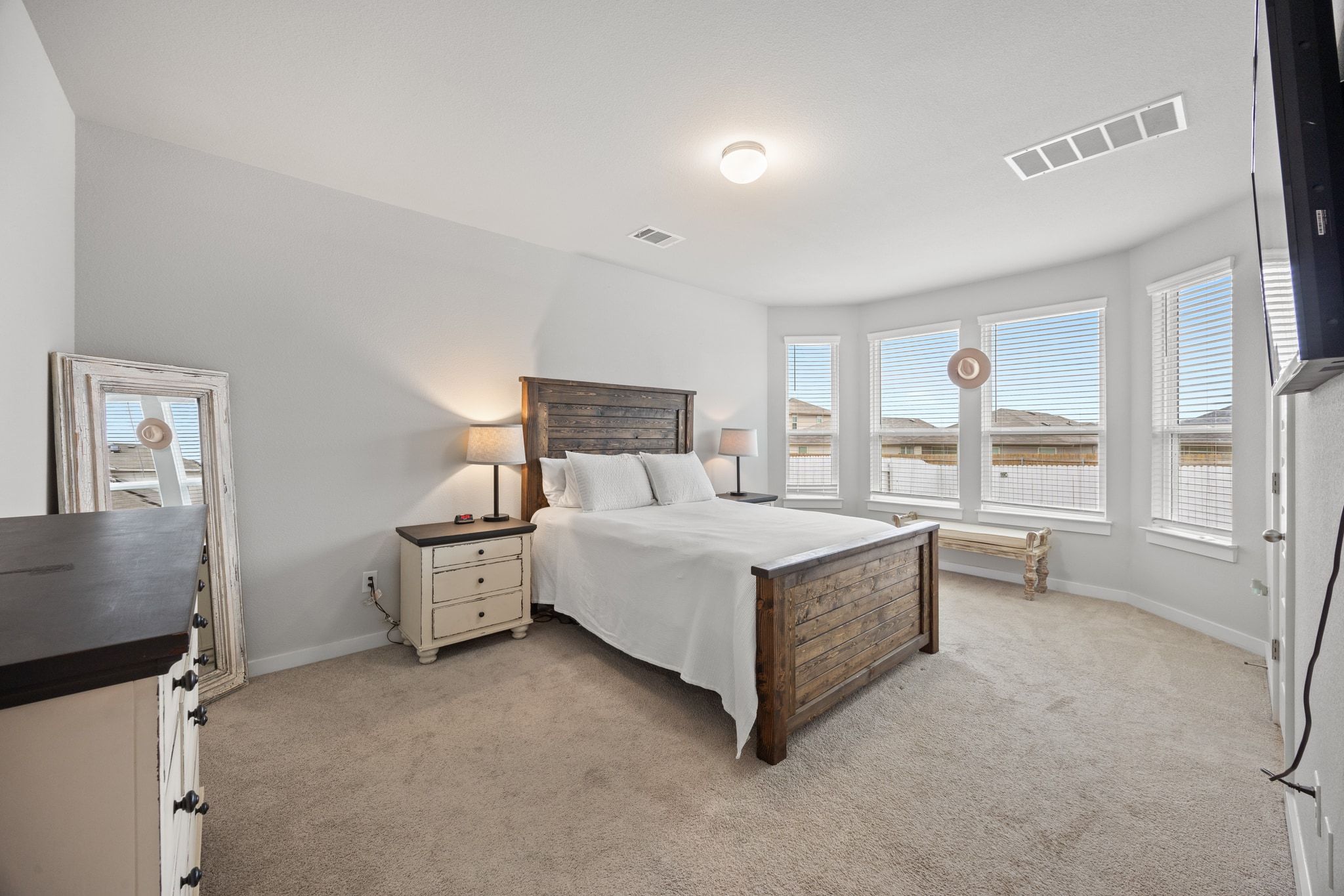 161 Appleberry Lane Elgin, TX 78621 - Photo 19 of 40 a bed room with a bed and window