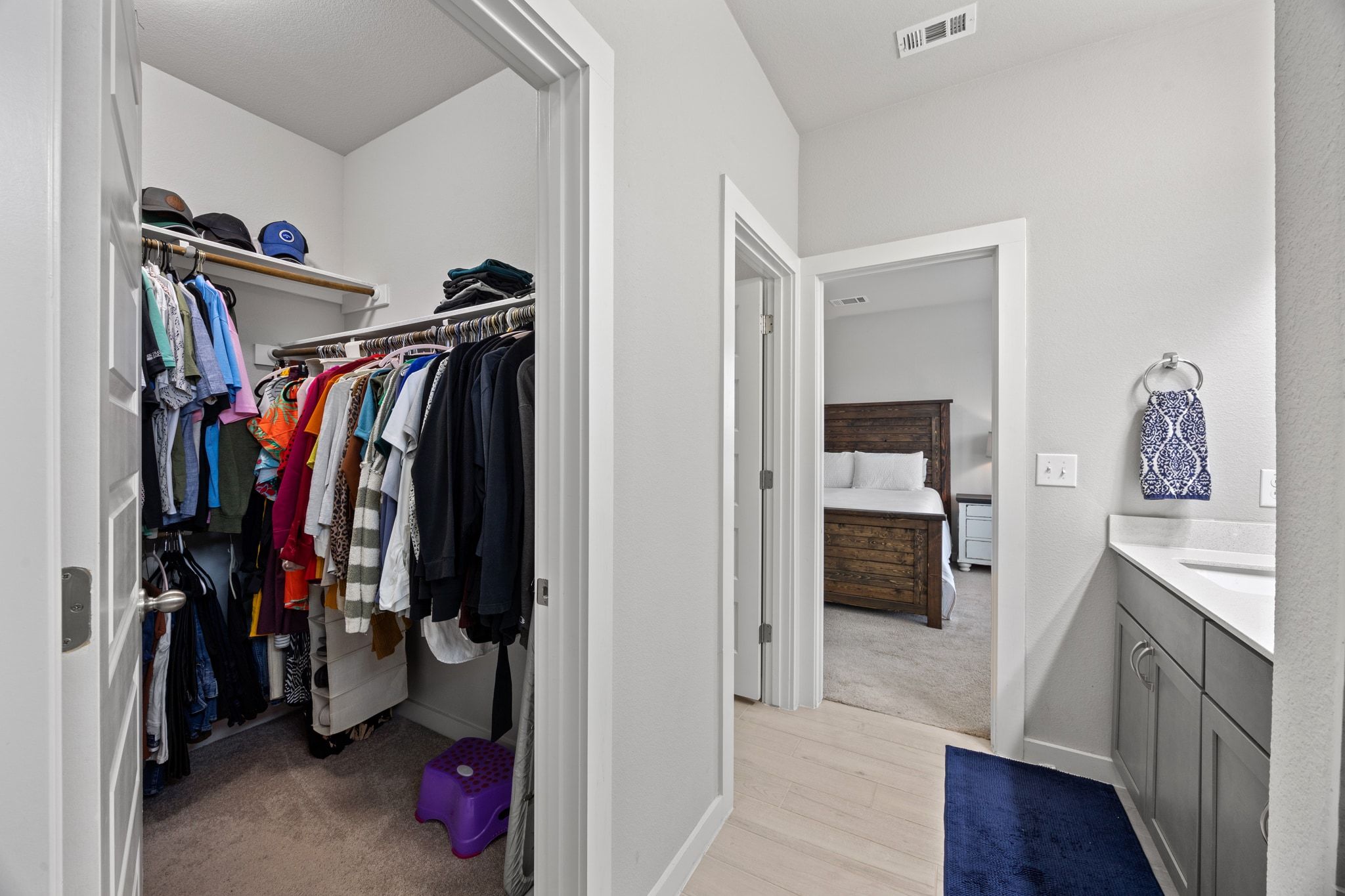 161 Appleberry Lane Elgin, TX 78621 - Photo 24 of 40 a view of walk in closet with clothes and shoes