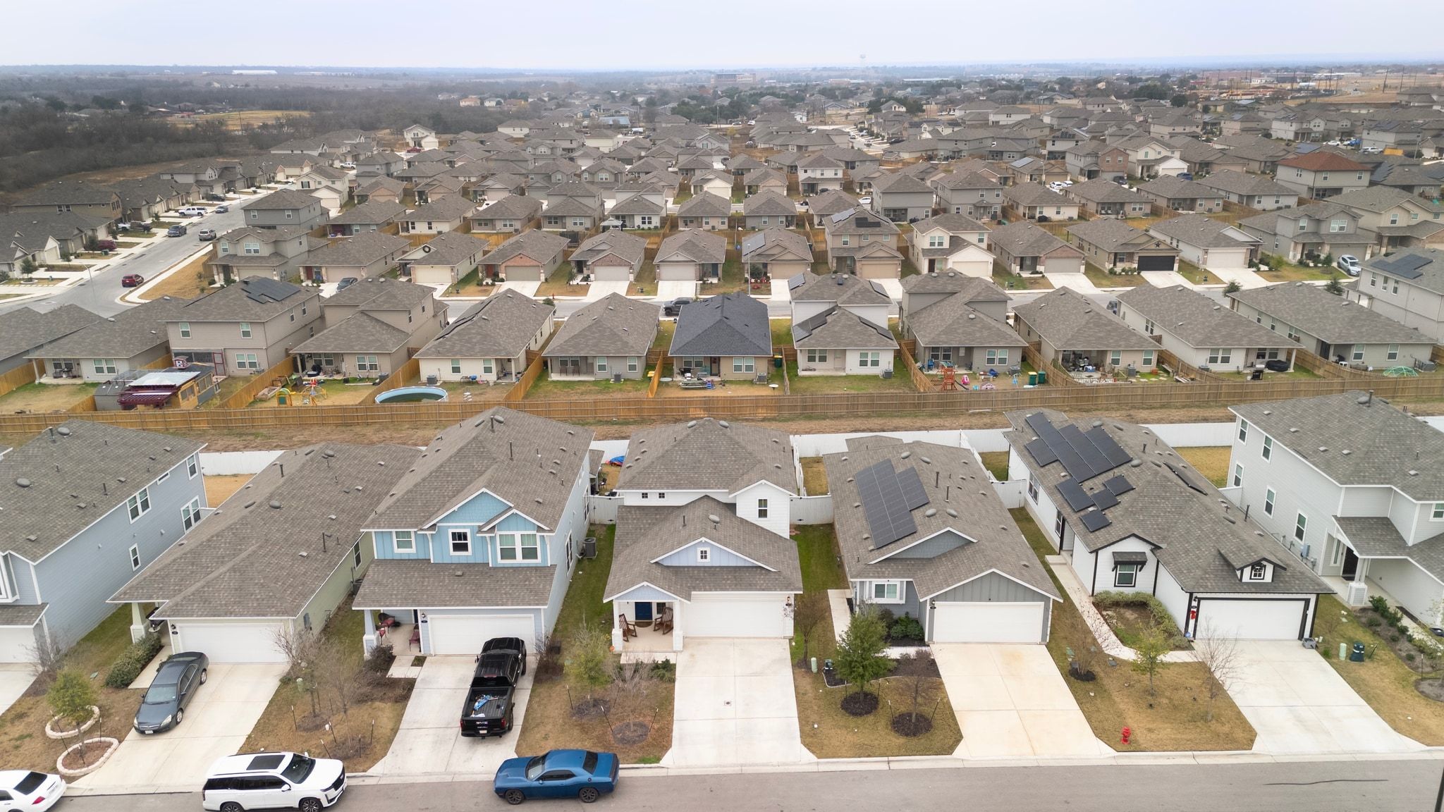 161 Appleberry Lane Elgin, TX 78621 - Photo 35 of 40 an aerial view of residential building and lake view