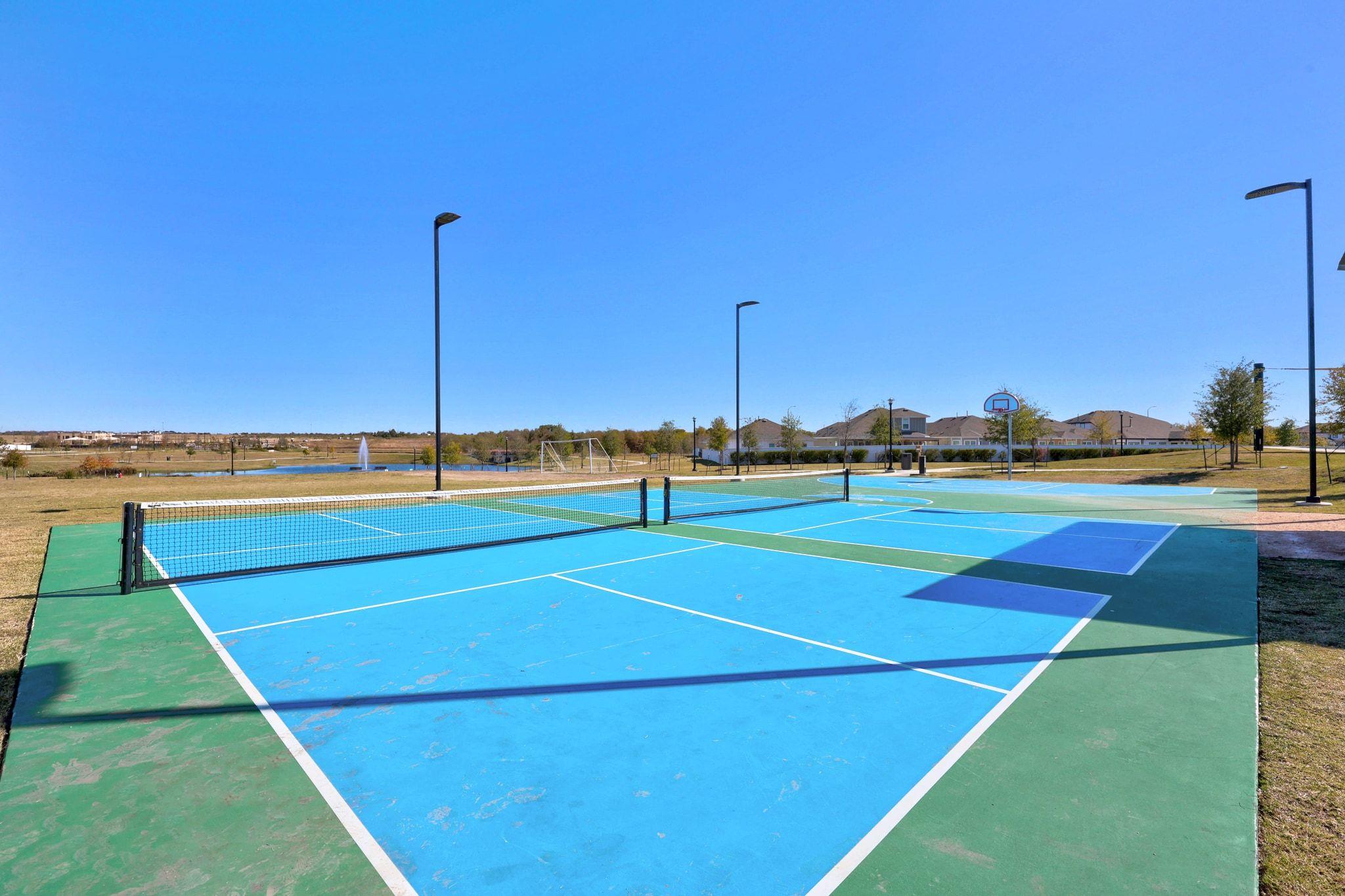 161 Appleberry Lane Elgin, TX 78621 - Photo 40 of 40 a view of an outdoor space and tennis court